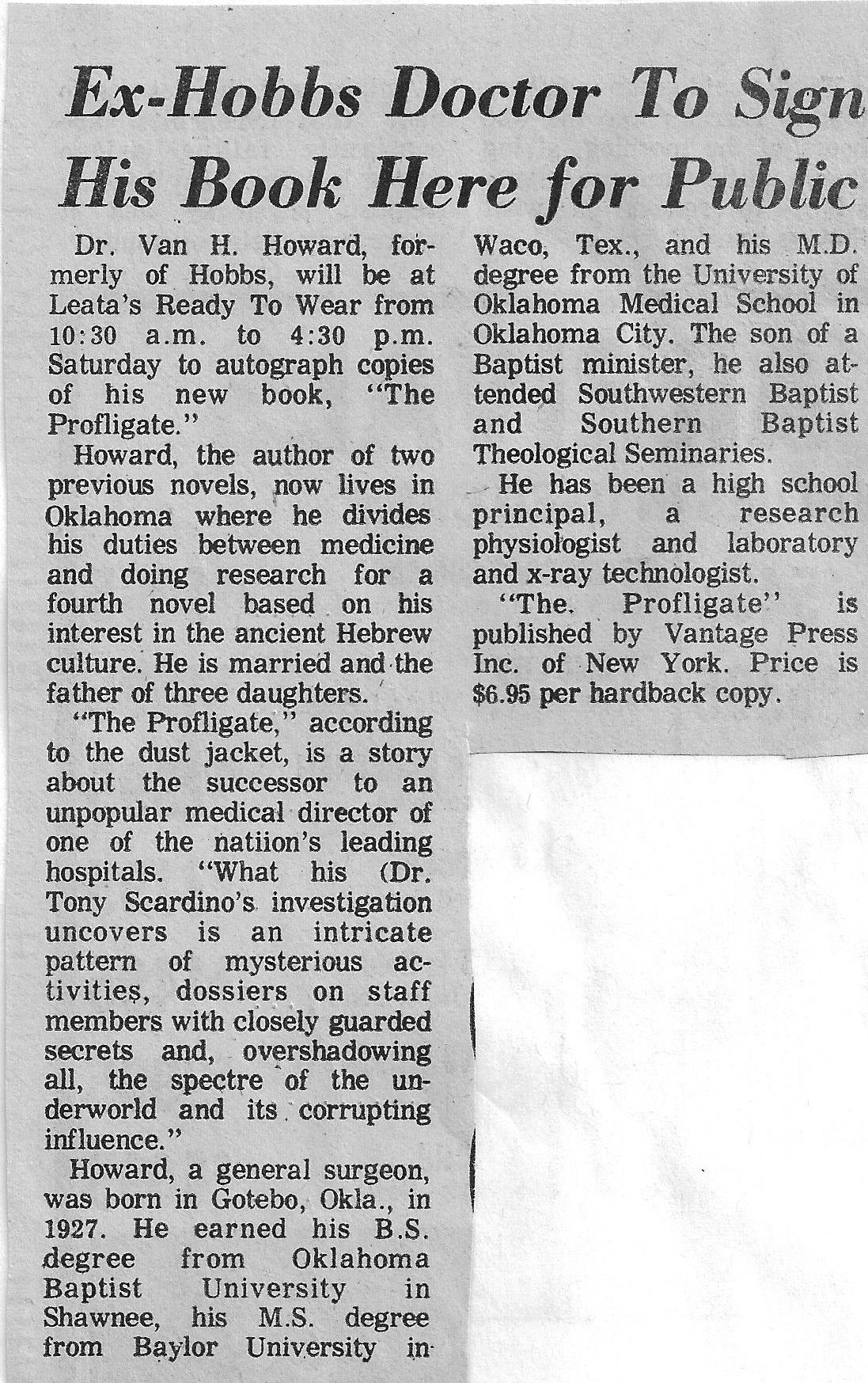 Dr. Howard signs his book at Leta's